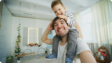 a dad playing with his son